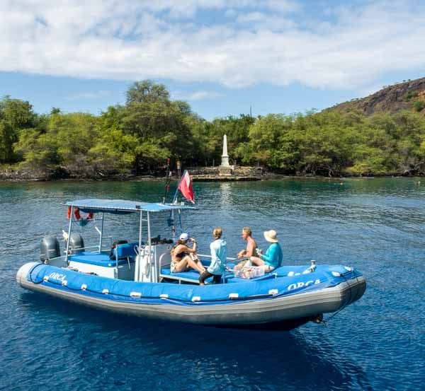 The RHIB anchored off the white Captain Cook Monument
