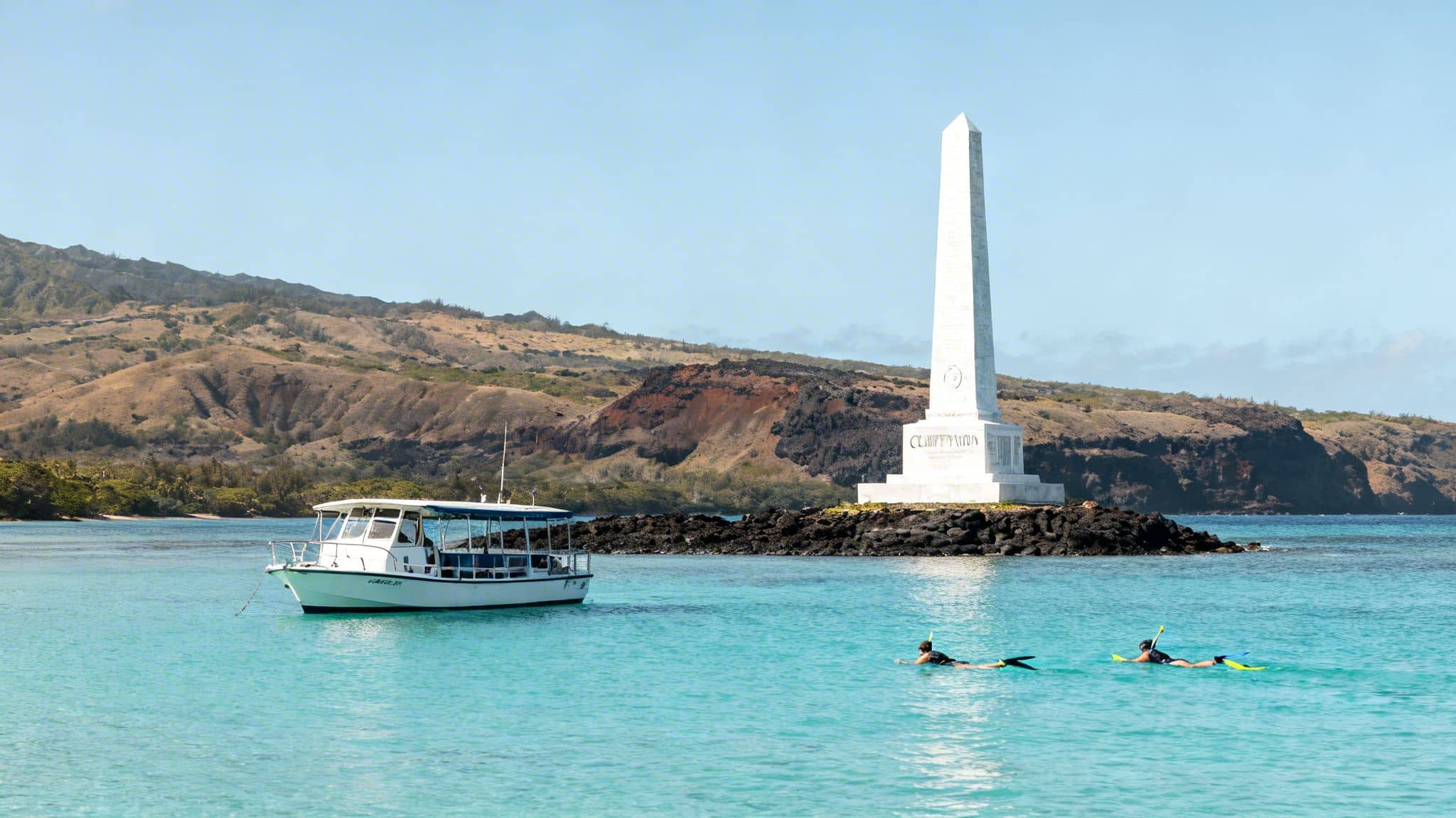 A white boat and two snorkelers in turquoise water near Captain Cook's monument and hills.